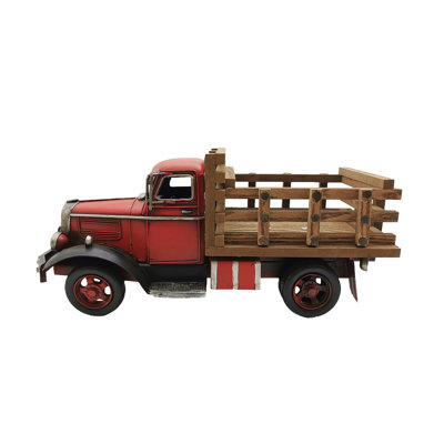Sculpture de camion vert en métal