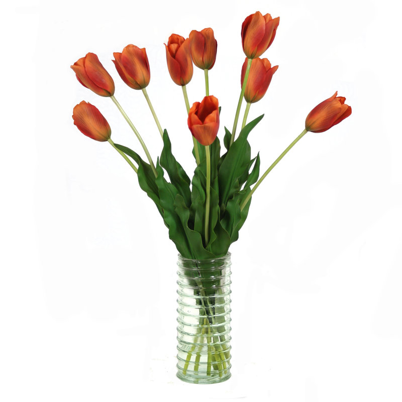 Orange Tulips In Glass Ribbed Vase
