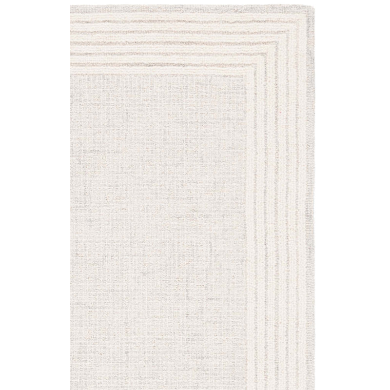 Khameron Ebony Hand Tufted Wool And Cotton Bordered Rug, Rectangle 2' x 3'