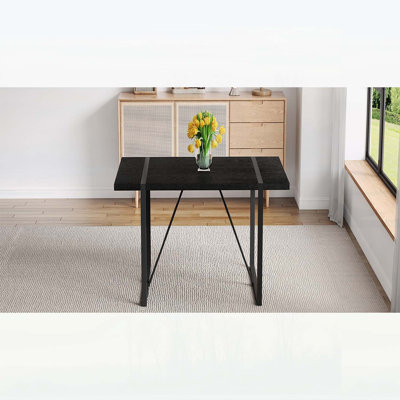 Table de salle à manger rectangulaire minimaliste de 55 pouces avec plateau texturé noir et pieds en métal