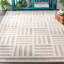 Tapis ivoire / beige en polypropylène tissé à la machine Daevon-89609781
