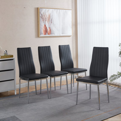 Ensemble de 4 chaises, pieds chromés, siège noir
