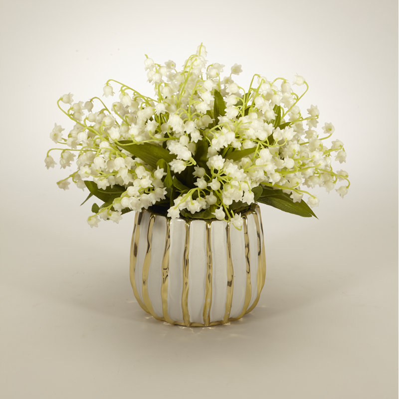 Lilly of the Valley Flowering in Decorative Vase