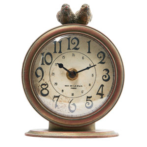 https://assets.wfcdn.com/im/06437495/resize-h300-w300%5Ecompr-r85/2401/240143442/Balf+Decorative+Pewter+Mantel+Clock+with+Bird.jpg
