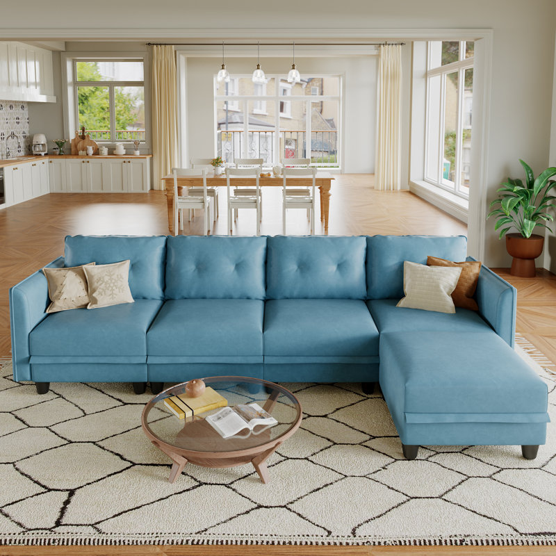 Tomario 111.8" Wide Faux leather Reversible Modular Sofa & Chaise with Storage Ottoman, Green Faux Leather