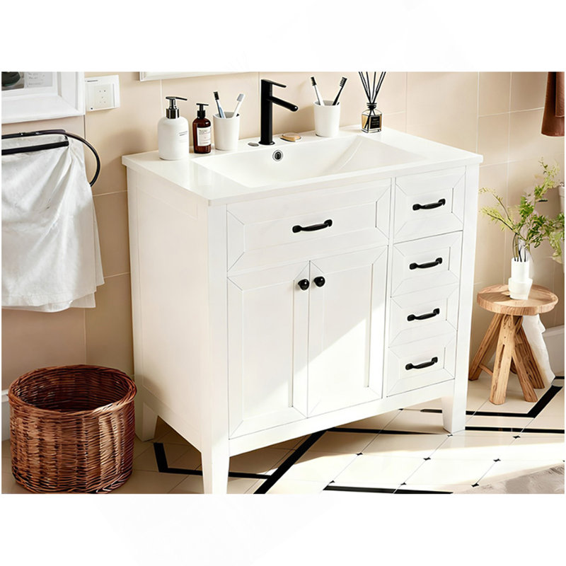 Salle de bain avec lavabo encastré en céramique, armoire simple moderne avec tiroirs et portes, blanc