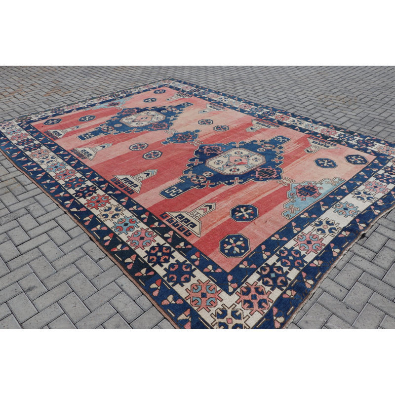 Tapis turc en laine fabriqué à la main avec un motif ethnique idéal pour les espaces surdimensionnés