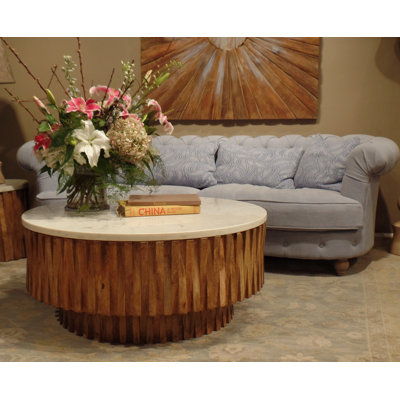 Table basse ronde avec plateau en marbre et bandes en bois