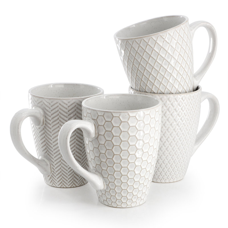 Gibson Elite Earlhart 4 Piece 16 Ounce Stoneware Assorted Pattern Mug Set in White
