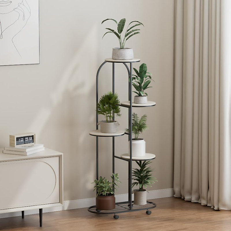 Support pour plante mobile en métal à plusieurs niveaux avec roulettes - Tablette robuste à 5 couches pour plusieurs plantes d'intérieur - Support à fleurs peu encombrant pour le salon, le jardin, le patio - Noir