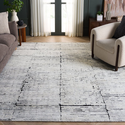 Tapis noir / ivoire en laine / coton touffeté à la main Anindita