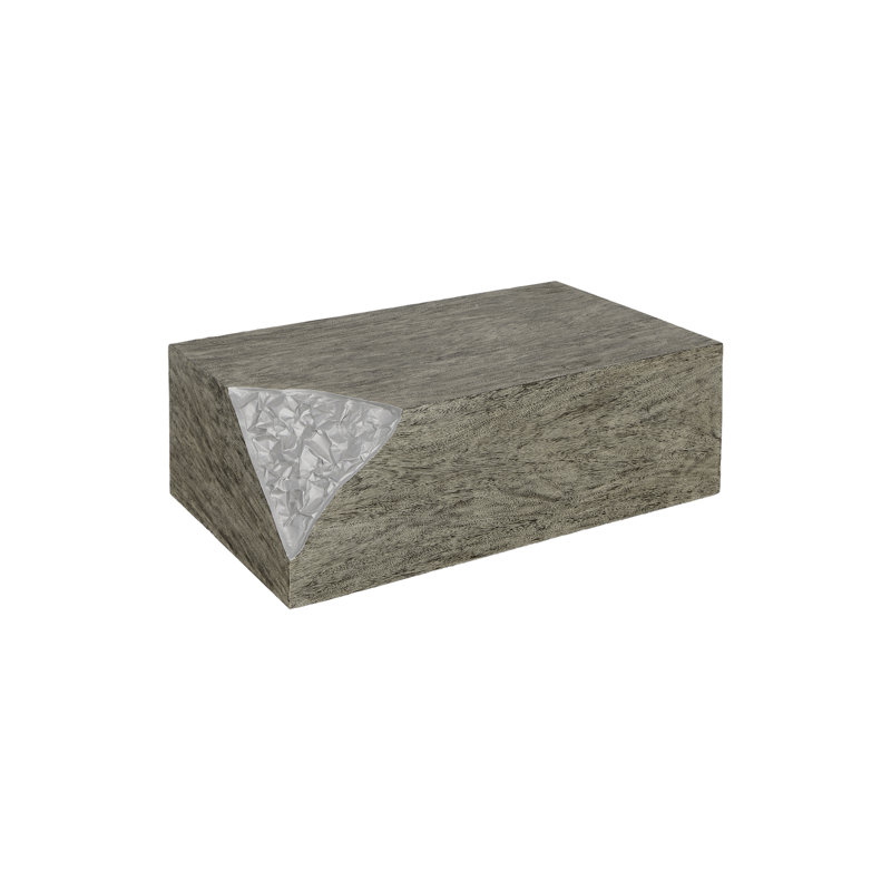 Table basse ciselée, pierre grise, argent