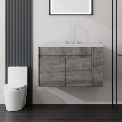Meuble-lavabo suspendu de 91 cm (36 po) avec lavabo en céramique, 2 portes à fermeture amortie, comptoir et dosseret en marbre reconstitué blanc de Carrare de 5 cm (2 po), contreplaqué, gris