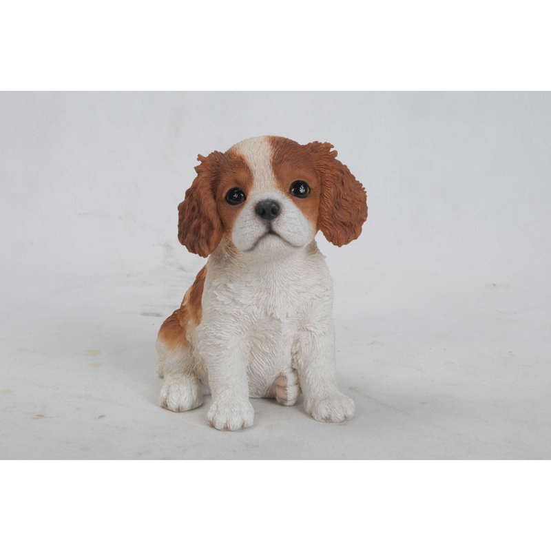 Statue chiot king charles assis