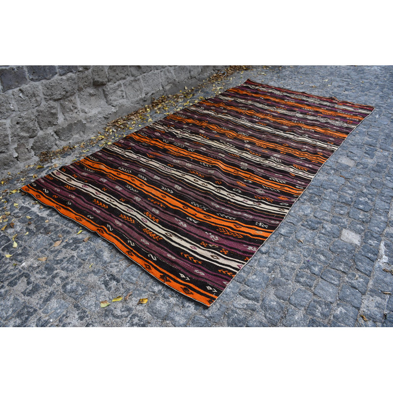 Tapis turc rétro à rayures orange et brunes offre une touche bohémienne pour un décor ethnique brun / orange