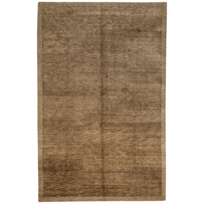 Tapis brun en laine noué à la main