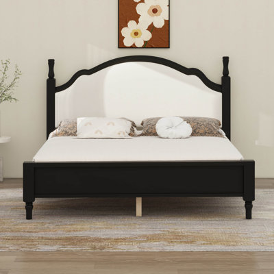 Lit plateforme en bois avec tête de lit tapissier