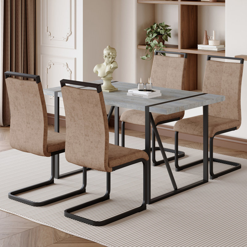 Ensemble de table et de chaises Table de salle à manger en MDF texturé en marbre minimaliste moderne jumelée à 4 chaises en tissu