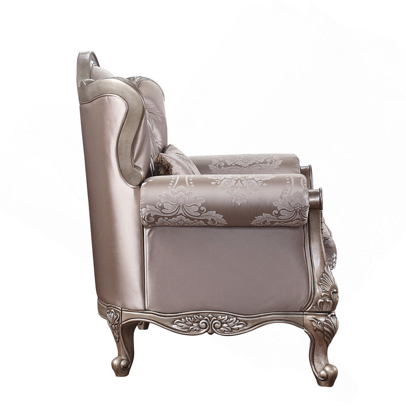 Chaise en tissu et champagne avec coussin