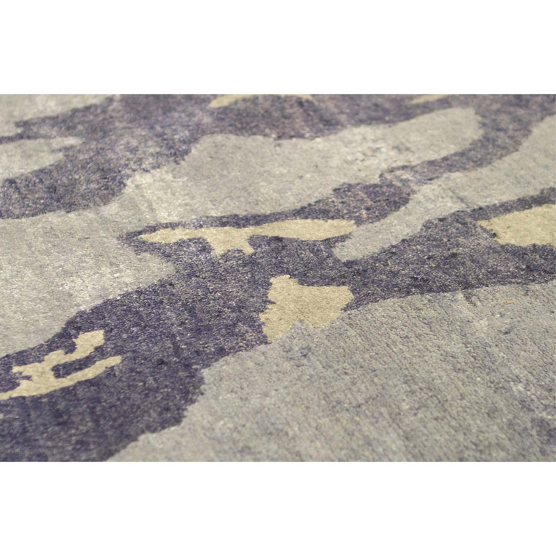 Tapis bleu de haute qualité noué à la main