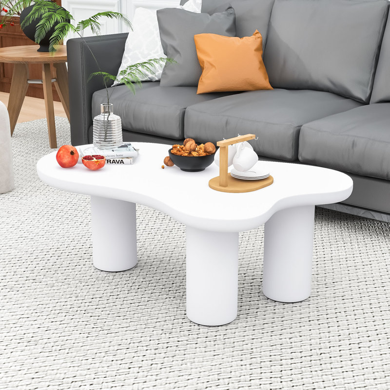 Table basse moderne en forme de nuage avec bords arrondis et pieds cylindriques, Blanc