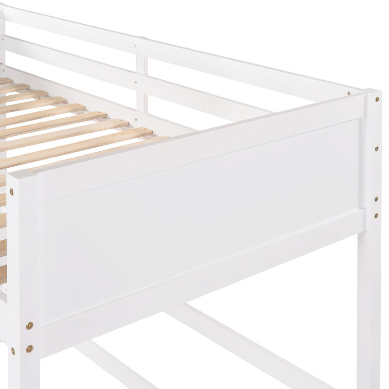 Lit mezzanine simple en bois massif blanc avec. Robuste et robuste. Aucune fondation requise. Garantie de 14 lattes pour un soutien stable. Barrières de sécurité pour. 79,5 po x 41,8 po 67,5 po. Assemblage requis