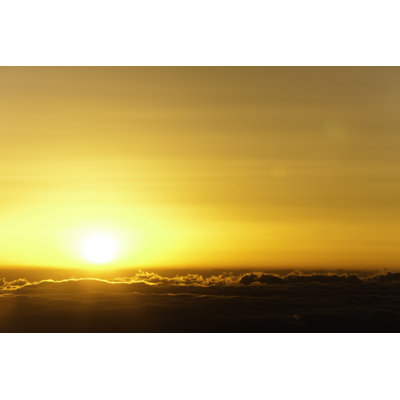 Sunrise in sea of clouds
