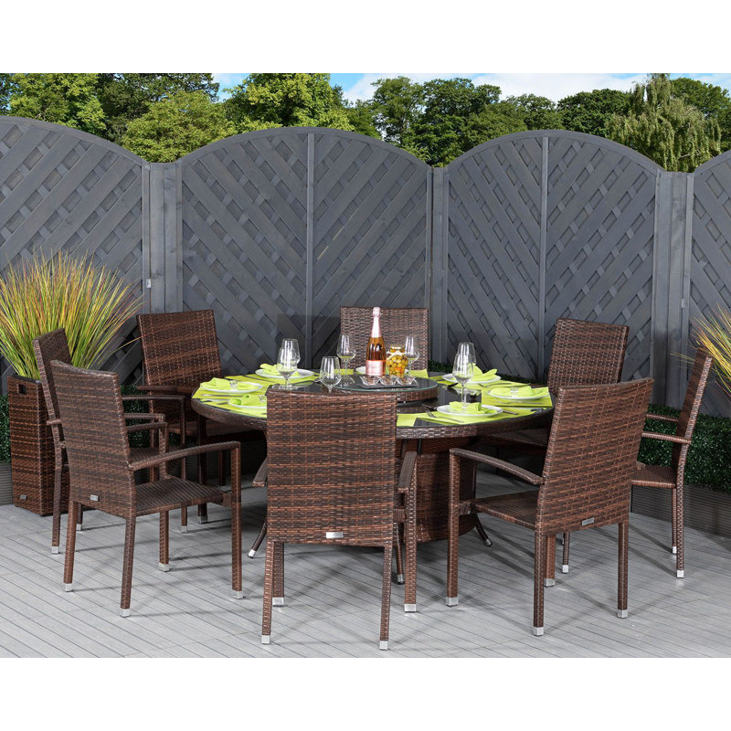 Erwin 8 - Person Patio Dining Set with Round Table , Cushions Included