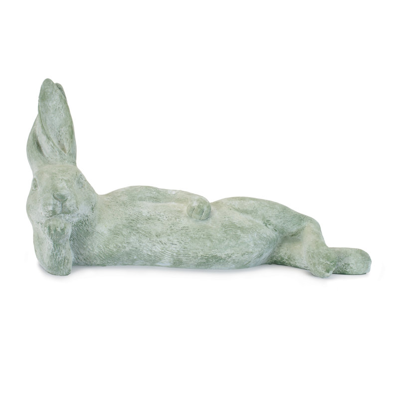 Figurine de lapin couché