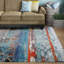 Tapis bleu à motif abstrait moderne Lagouira-665054727