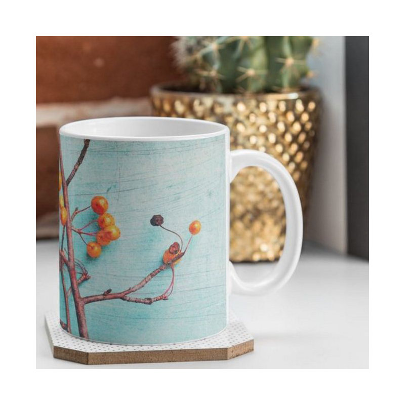 Tasse à café à ses rêves sur les branches