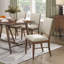 Table de salle à manger Design Pc et chaises en X rembourrées en tissu Backwooden