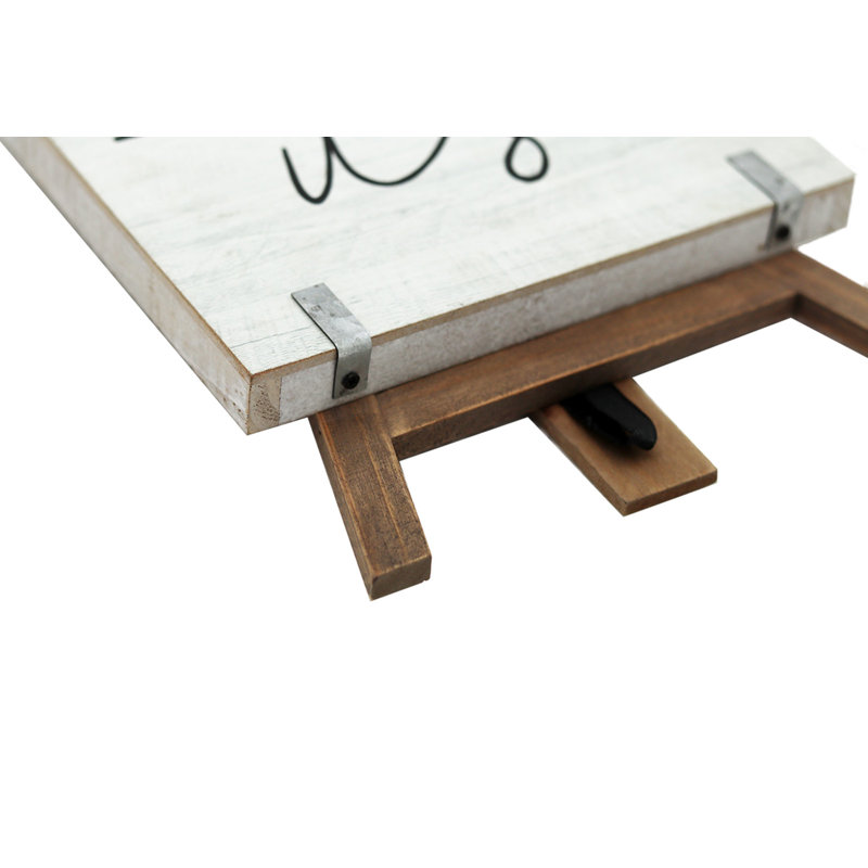 Il s’agit d’un décoration de table sur pied à cadre en bois us Cousins