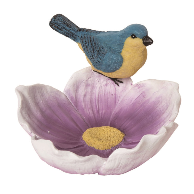 Oiseau en résine sur fleur