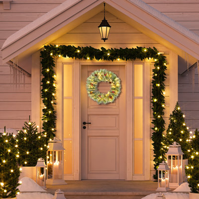 Paquet de 2 guirlandes de Noël pré-éclairées 24 po avec 100 lumières blanches chaudes | 180 pointes de branches, pommes de pin baies rouges, 8 modes d'éclairage | Convient à une porte d'entrée / porte / mur / fête de Noël | Décoration de Noël incontournable la mieux notée
