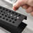 11.9 In.  Linear Grid Shower Drain With Leveling Feet And Flange In Matte Black