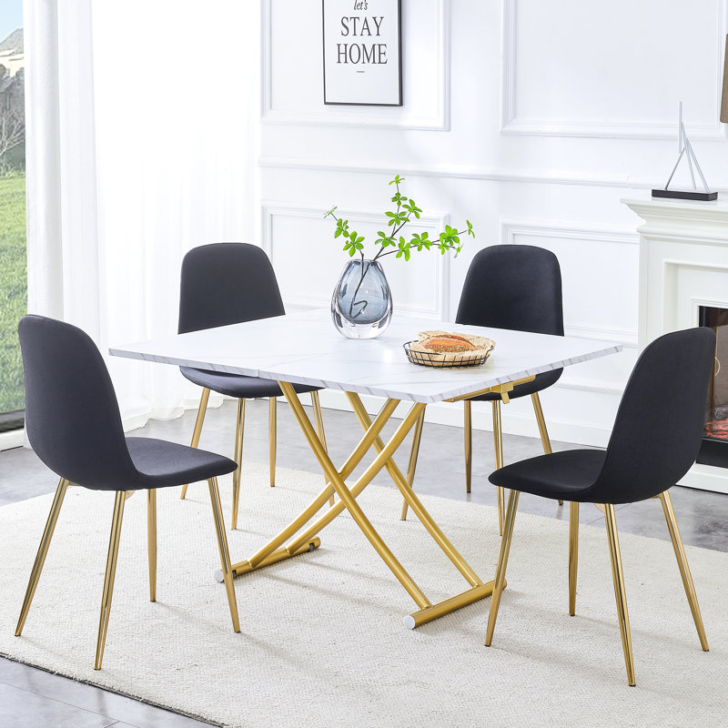 Table et chaise modernes et minimalistes modernes: quatre chaises en lin noir, bureau texturé blanc, pieds réglables en métal enduit doré pour la cuisine