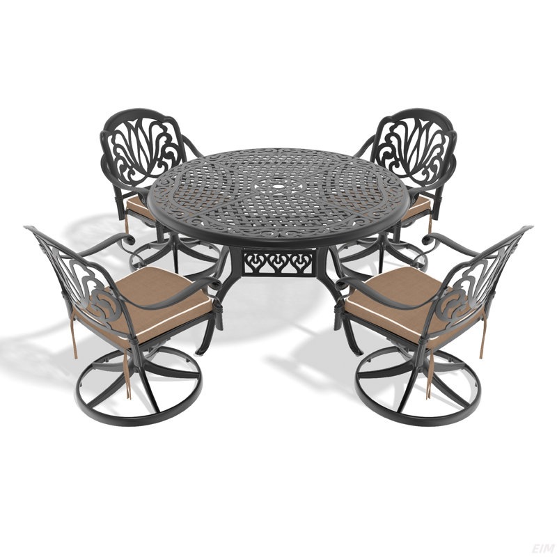 L'ensemble de salle à manger en fonte d'aluminium toutes saisons comprend des chaises pivotantes et une table avec un cadre noir