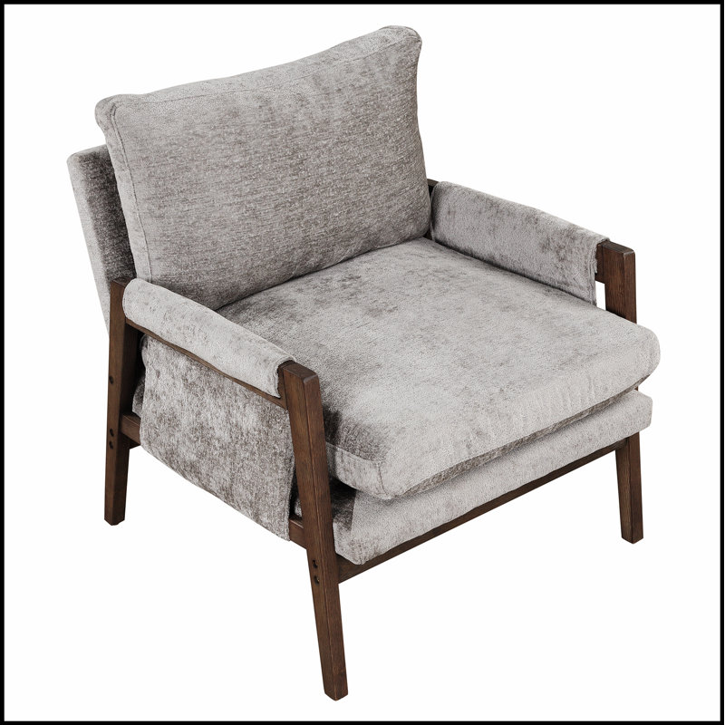 Fauteuil confortable en velours avec structure en bois massif, parfait pour des sièges élégants et relaxants dans diverses pièces