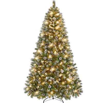 Arbre de Noël artificiel givré décoré de pommes de pin