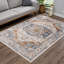 Tapis floral en polypropylène tissé à la machine gris clair / orange / bleu Kiaan-859404760