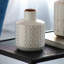 Accent rond blanc / vase or