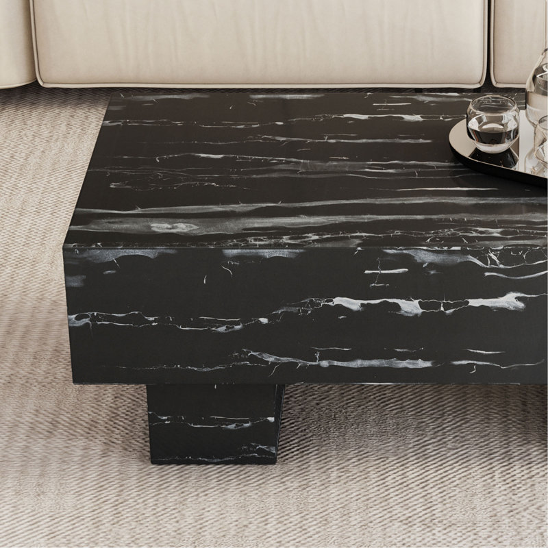 Table basse moderne et simple en bois aggloméré noir texturé - 43,3 po x 21,6 po x 17,2 po, ce qui en fait un ajout idéal à tout salon ou appartement.