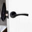 5 Pairs Astrid Twist Design Door Handles on Round Rose in Matt Black Finish