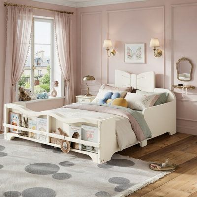 Lit de sol Montessori pour enfants avec garde-corps à contour complet, lit princesse en bois massif avec tête de lit Bowknot 3D