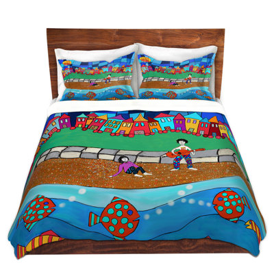 Ensemble de housse de couette de plage assis par the beach