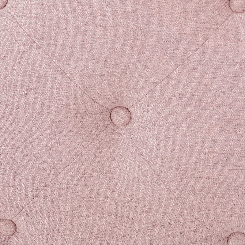 Tête de lit simple en rosé, illustrant un magnifique bouton en losange et une garniture cloutée élégante et captivante