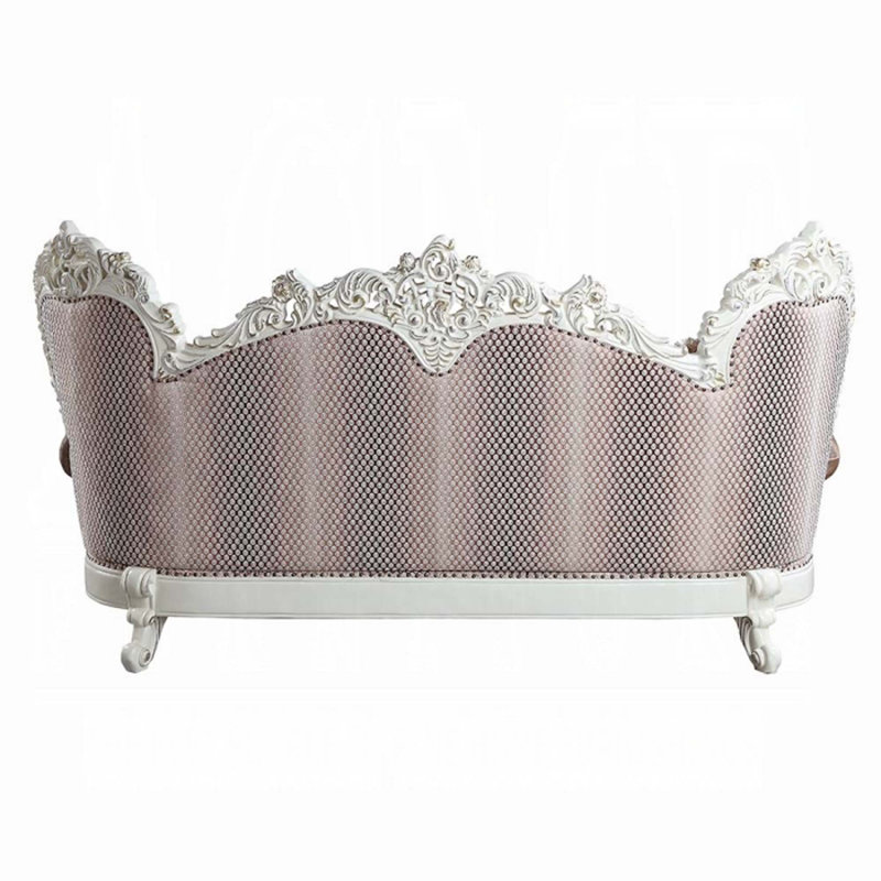 Antique White Tufted Sofa with Floral Cushions and Nailhead Trim