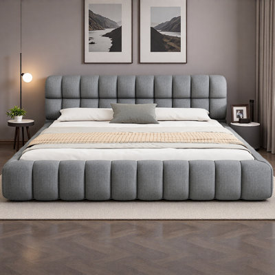 Upholstered Platform Bed With Stitching Details And Strong Support