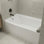 Baignoire de trempage en alcôve en acrylique avec tablier frontal 54 po Condris, débordement rond, drain à gauche, blanc Condris